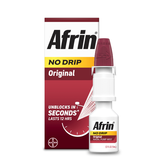 Afrin original no drip nasal spray packaging next to nasal spray bottle