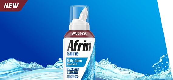 Afrin ® Saline Daily Care Nasal Mist spray bottle against a blue background with splashing water. The packaging highlights 'Drug Free' and 'Instantly Clears Out Everyday Congestion.' A 'NEW' label is displayed in the top left corner.